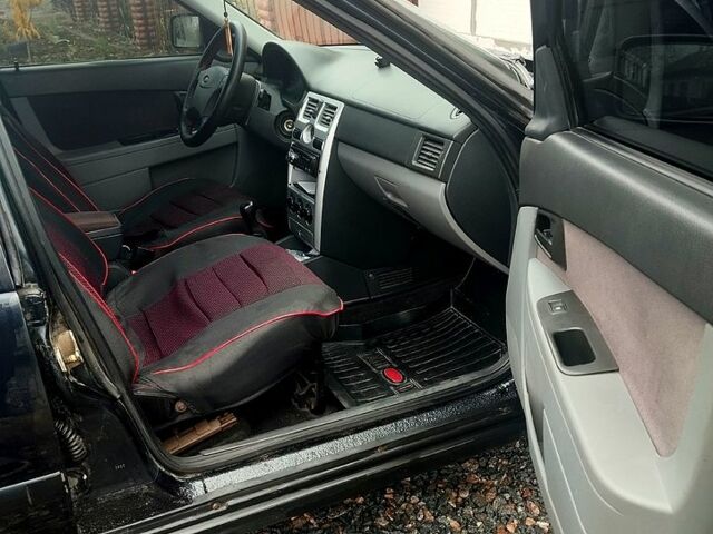 Черный ВАЗ Priora, объемом двигателя 1.6 л и пробегом 161 тыс. км за 2000 $, фото 7 на Automoto.ua