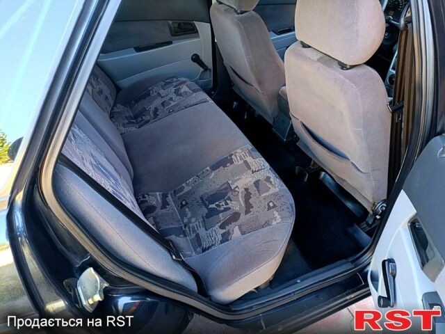 Чорний ВАЗ Priora, об'ємом двигуна 1.6 л та пробігом 138 тис. км за 2900 $, фото 7 на Automoto.ua