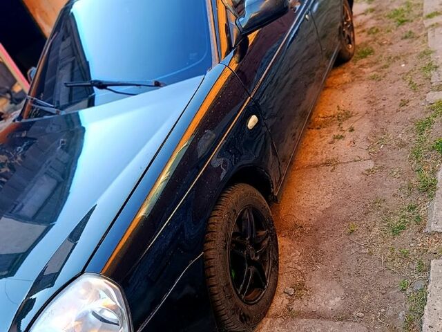 Чорний ВАЗ Priora, об'ємом двигуна 1.6 л та пробігом 224 тис. км за 1520 $, фото 1 на Automoto.ua