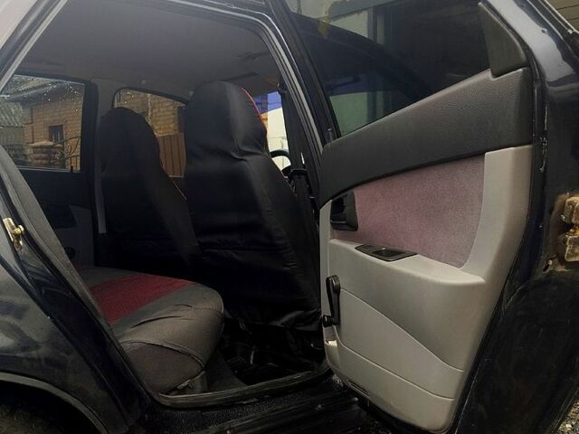 Черный ВАЗ Priora, объемом двигателя 1.6 л и пробегом 161 тыс. км за 2000 $, фото 8 на Automoto.ua