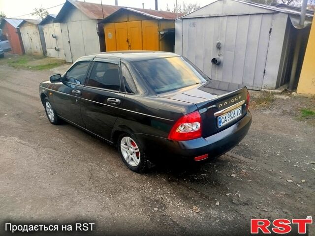 Черный ВАЗ Priora, объемом двигателя 1.6 л и пробегом 142 тыс. км за 2450 $, фото 6 на Automoto.ua