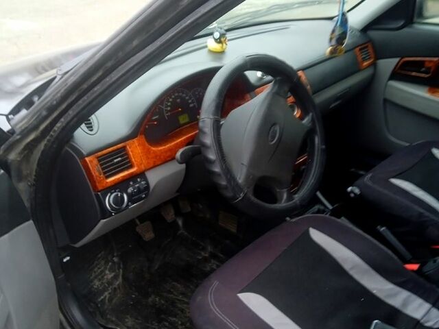 Чорний ВАЗ Priora, об'ємом двигуна 1.6 л та пробігом 157 тис. км за 1650 $, фото 7 на Automoto.ua