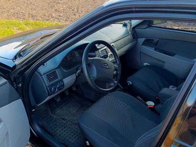 Черный ВАЗ Priora, объемом двигателя 1.6 л и пробегом 153 тыс. км за 3500 $, фото 5 на Automoto.ua