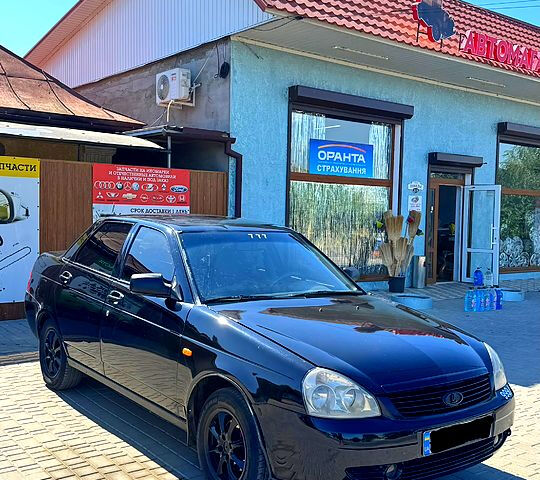 Черный ВАЗ Priora, объемом двигателя 1.6 л и пробегом 200 тыс. км за 2400 $, фото 1 на Automoto.ua