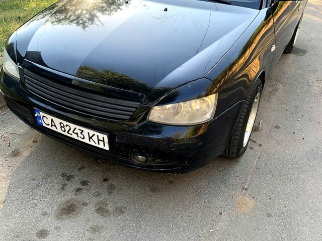 Черный ВАЗ Priora, объемом двигателя 1.6 л и пробегом 250 тыс. км за 2200 $, фото 1 на Automoto.ua