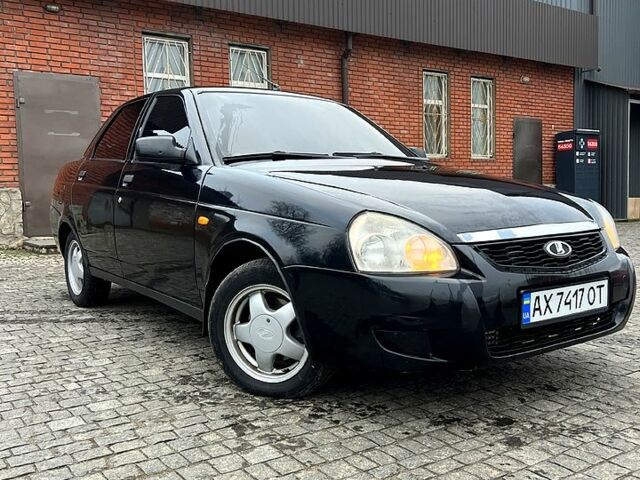 Чорний ВАЗ Priora, об'ємом двигуна 1.6 л та пробігом 156 тис. км за 2300 $, фото 1 на Automoto.ua