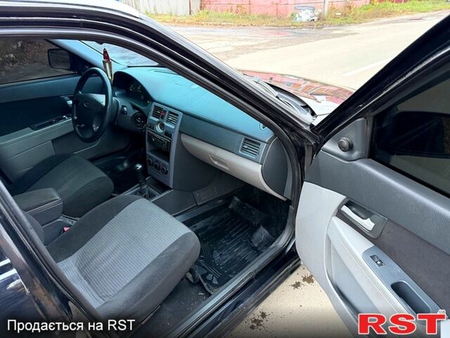 Черный ВАЗ Priora, объемом двигателя 1.6 л и пробегом 185 тыс. км за 2250 $, фото 11 на Automoto.ua