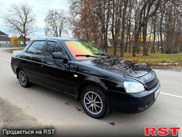 Черный ВАЗ Priora, объемом двигателя 1.6 л и пробегом 185 тыс. км за 2250 $, фото 1 на Automoto.ua