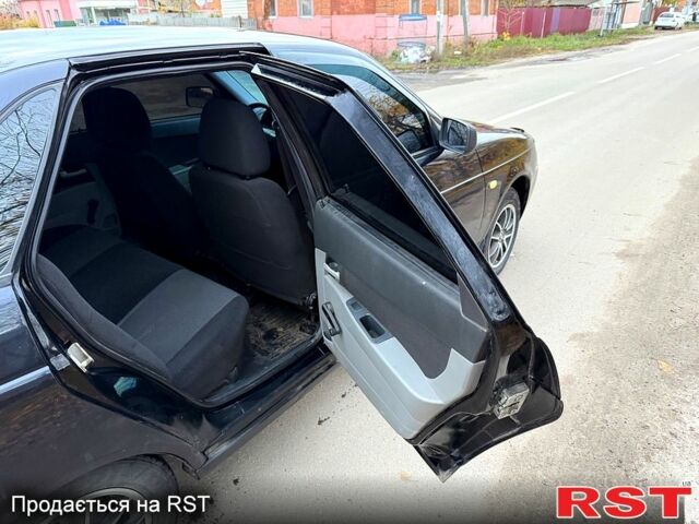 Черный ВАЗ Priora, объемом двигателя 1.6 л и пробегом 185 тыс. км за 2250 $, фото 10 на Automoto.ua