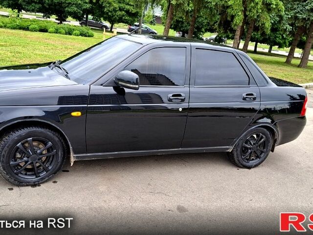 Черный ВАЗ Priora, объемом двигателя 1.6 л и пробегом 303 тыс. км за 3900 $, фото 1 на Automoto.ua