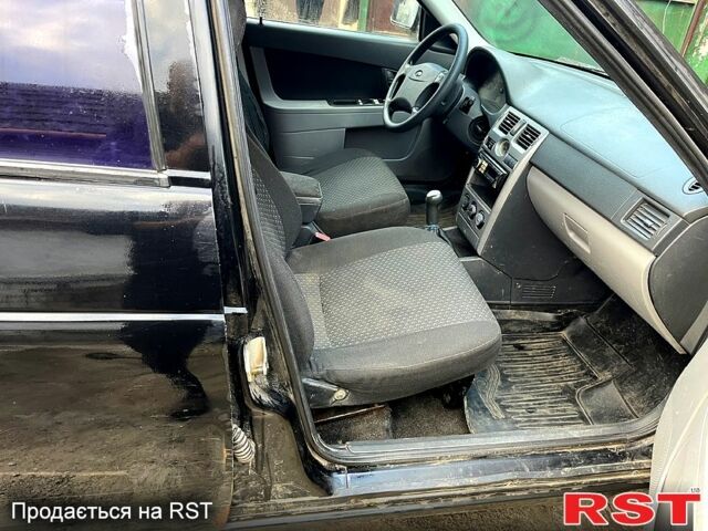 Чорний ВАЗ Priora, об'ємом двигуна 1.6 л та пробігом 283 тис. км за 1000 $, фото 2 на Automoto.ua