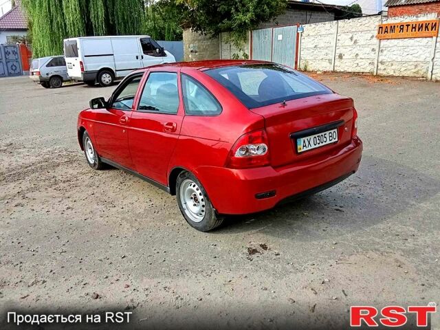 Червоний ВАЗ Priora, об'ємом двигуна 1.6 л та пробігом 180 тис. км за 1550 $, фото 1 на Automoto.ua