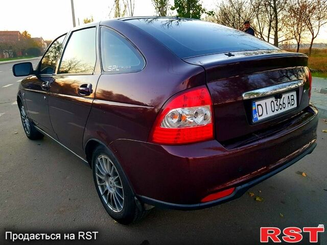 Красный ВАЗ Priora, объемом двигателя 1.6 л и пробегом 118 тыс. км за 3900 $, фото 1 на Automoto.ua