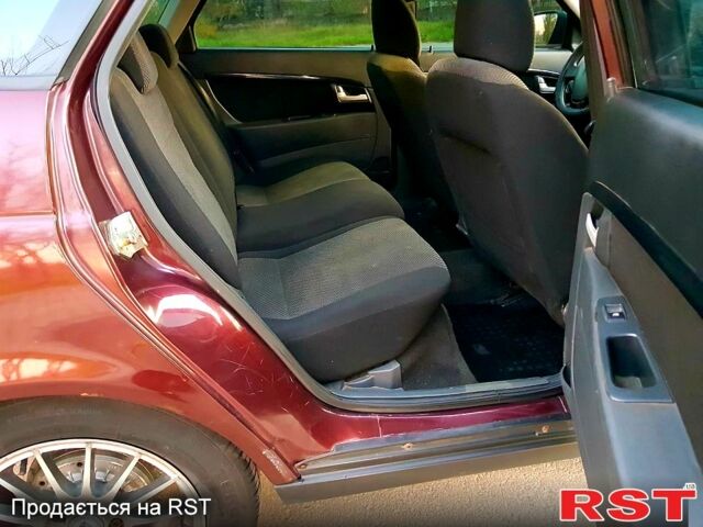 Красный ВАЗ Priora, объемом двигателя 1.6 л и пробегом 118 тыс. км за 3900 $, фото 10 на Automoto.ua