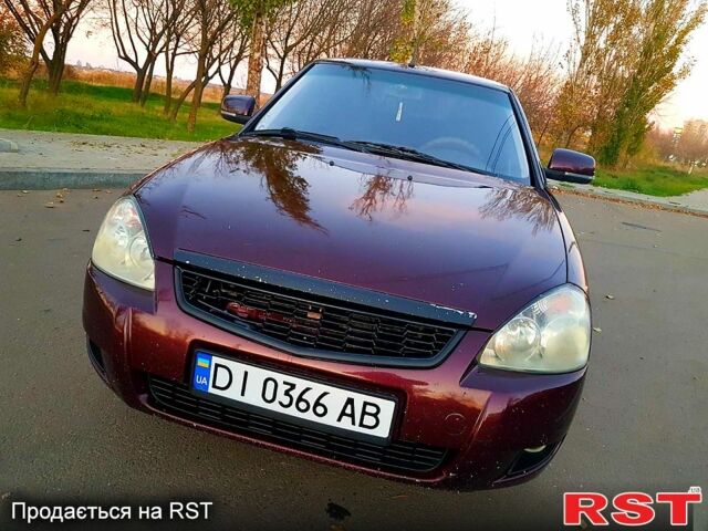 Красный ВАЗ Priora, объемом двигателя 1.6 л и пробегом 118 тыс. км за 3900 $, фото 6 на Automoto.ua