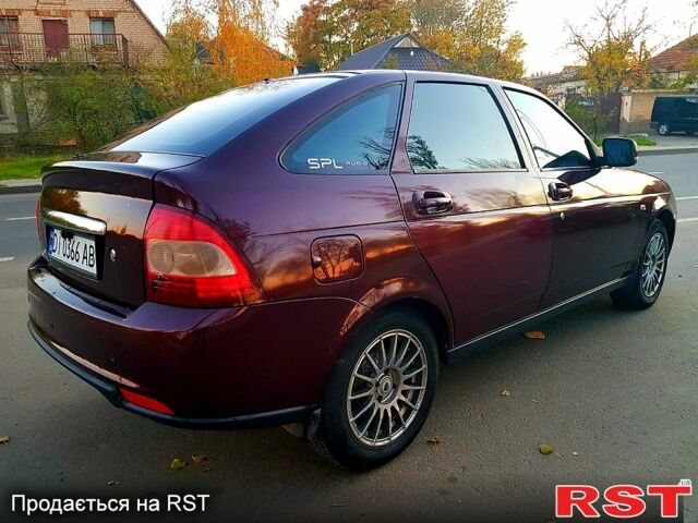 Красный ВАЗ Priora, объемом двигателя 1.6 л и пробегом 118 тыс. км за 3900 $, фото 2 на Automoto.ua