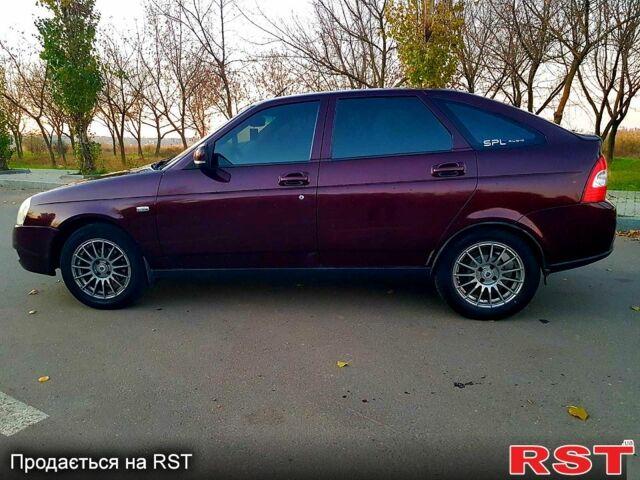 Красный ВАЗ Priora, объемом двигателя 1.6 л и пробегом 118 тыс. км за 3900 $, фото 4 на Automoto.ua