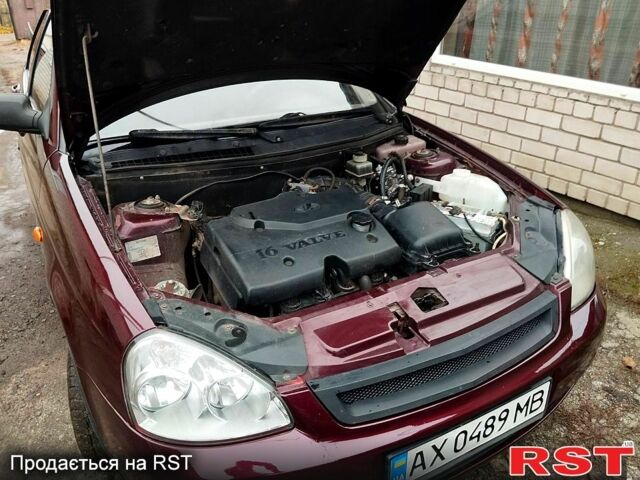 Красный ВАЗ Priora, объемом двигателя 1.6 л и пробегом 60 тыс. км за 3100 $, фото 6 на Automoto.ua
