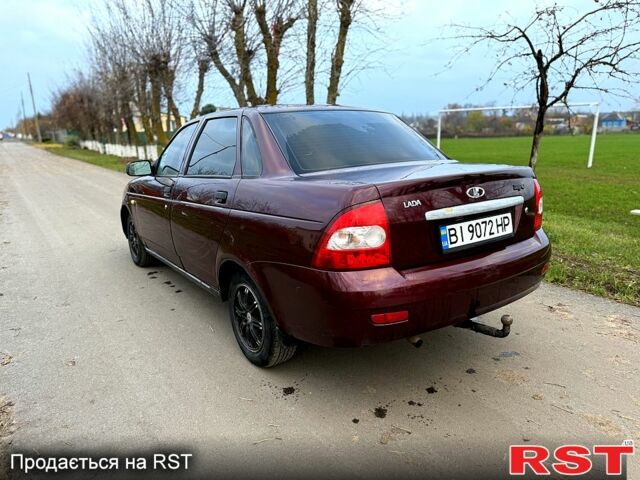 Красный ВАЗ Priora, объемом двигателя 1.6 л и пробегом 150 тыс. км за 1750 $, фото 1 на Automoto.ua