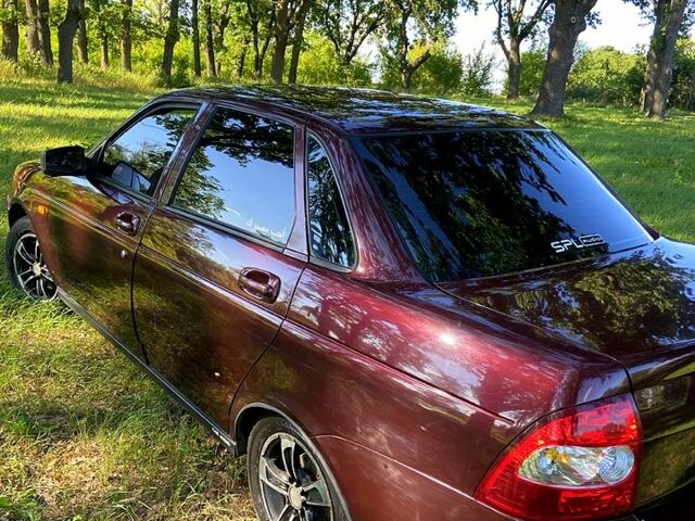 Червоний ВАЗ Priora, об'ємом двигуна 1.6 л та пробігом 242 тис. км за 2600 $, фото 3 на Automoto.ua
