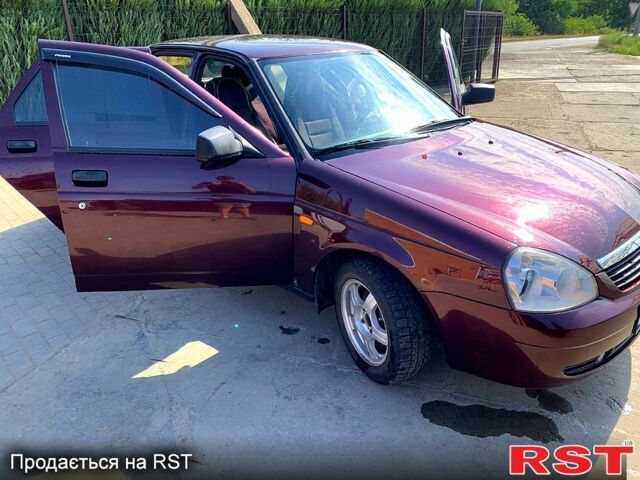 Красный ВАЗ Priora, объемом двигателя 1.6 л и пробегом 222 тыс. км за 2650 $, фото 7 на Automoto.ua