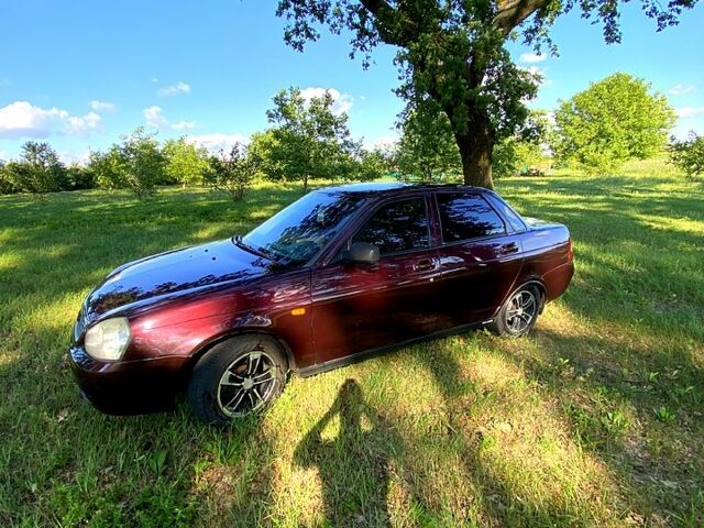 Червоний ВАЗ Priora, об'ємом двигуна 1.6 л та пробігом 242 тис. км за 2600 $, фото 1 на Automoto.ua