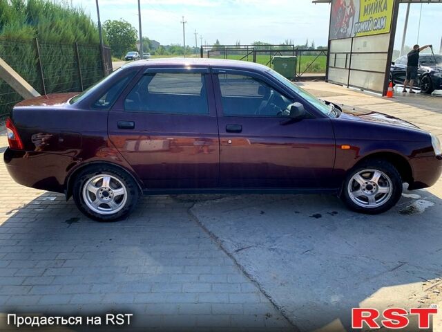 Красный ВАЗ Priora, объемом двигателя 1.6 л и пробегом 222 тыс. км за 2650 $, фото 1 на Automoto.ua