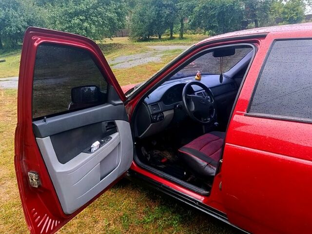 Красный ВАЗ Priora, объемом двигателя 1.6 л и пробегом 162 тыс. км за 2800 $, фото 1 на Automoto.ua
