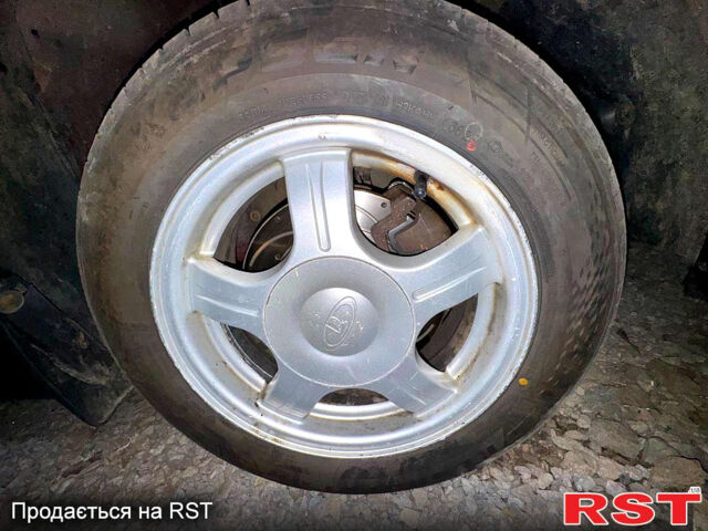 Красный ВАЗ Priora, объемом двигателя 1.6 л и пробегом 250 тыс. км за 3200 $, фото 11 на Automoto.ua