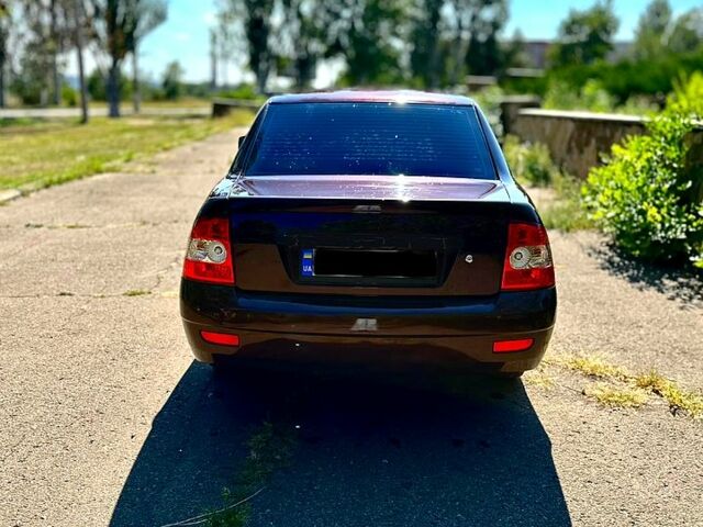 Красный ВАЗ Priora, объемом двигателя 1.6 л и пробегом 176 тыс. км за 3500 $, фото 2 на Automoto.ua