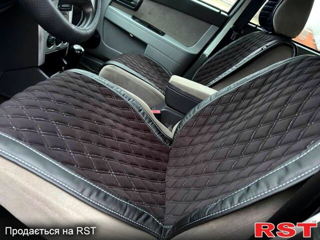 Серый ВАЗ Priora, объемом двигателя 1.6 л и пробегом 229 тыс. км за 2590 $, фото 6 на Automoto.ua