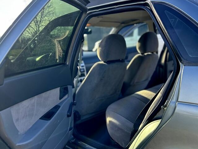 Серый ВАЗ Priora, объемом двигателя 1.6 л и пробегом 180 тыс. км за 3100 $, фото 7 на Automoto.ua