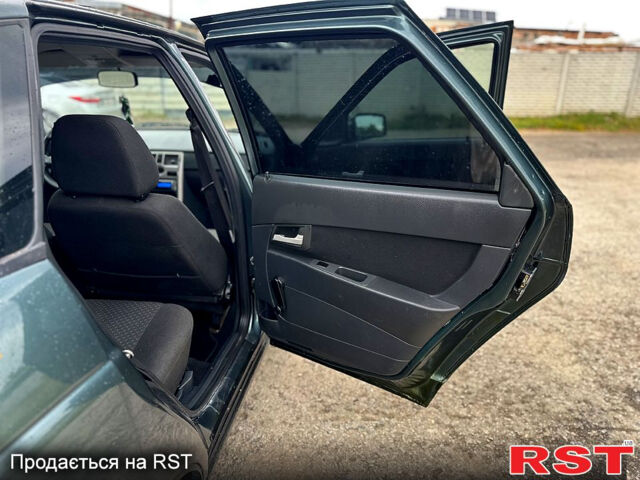 Зелений ВАЗ Priora, об'ємом двигуна 1.6 л та пробігом 125 тис. км за 3199 $, фото 8 на Automoto.ua