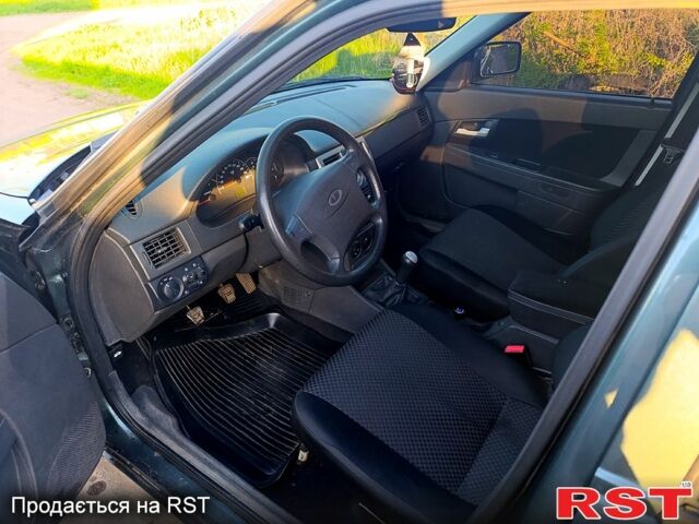 Зеленый ВАЗ Priora, объемом двигателя 1.6 л и пробегом 44 тыс. км за 3600 $, фото 7 на Automoto.ua