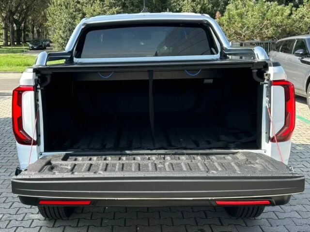 Білий Фольксваген Амарок, об'ємом двигуна 3 л та пробігом 12 тис. км за 14000 $, фото 11 на Automoto.ua