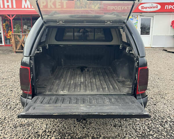 Черный Фольксваген Амарок, объемом двигателя 2 л и пробегом 250 тыс. км за 14900 $, фото 7 на Automoto.ua