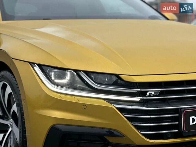 Жовтий Фольксваген Arteon, об'ємом двигуна 2 л та пробігом 179 тис. км за 28999 $, фото 27 на Automoto.ua