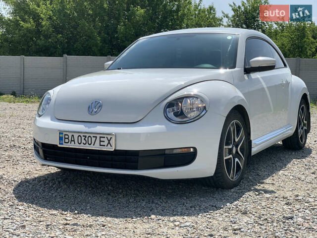 Белый Фольксваген Битл, объемом двигателя 2.5 л и пробегом 160 тыс. км за 10450 $, фото 1 на Automoto.ua