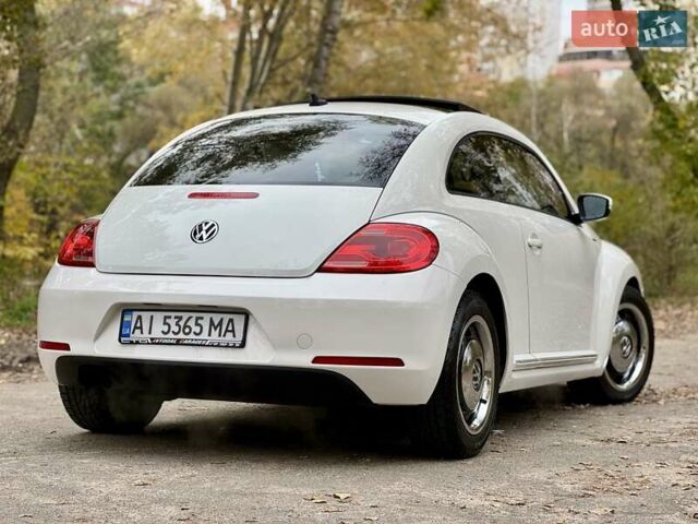 Белый Фольксваген Битл, объемом двигателя 2.5 л и пробегом 229 тыс. км за 9499 $, фото 4 на Automoto.ua