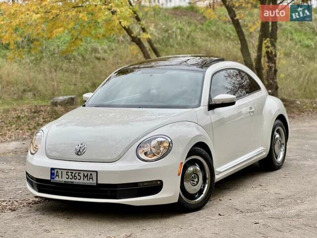 Белый Фольксваген Битл, объемом двигателя 2.5 л и пробегом 229 тыс. км за 9499 $, фото 1 на Automoto.ua