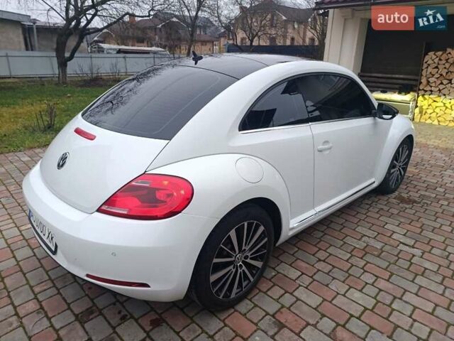 Белый Фольксваген Битл, объемом двигателя 1.6 л и пробегом 147 тыс. км за 9500 $, фото 8 на Automoto.ua