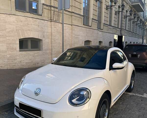 Белый Фольксваген Битл, объемом двигателя 1.4 л и пробегом 70 тыс. км за 13400 $, фото 1 на Automoto.ua