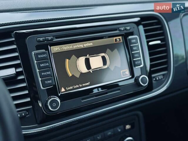 Белый Фольксваген Битл, объемом двигателя 1.97 л и пробегом 76 тыс. км за 16000 $, фото 17 на Automoto.ua