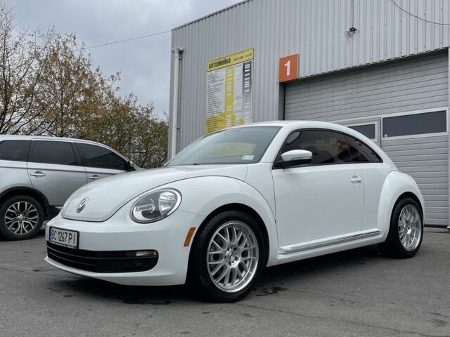 Белый Фольксваген Битл, объемом двигателя 1.8 л и пробегом 140 тыс. км за 11000 $, фото 1 на Automoto.ua