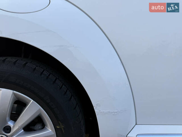 Белый Фольксваген Битл, объемом двигателя 1.4 л и пробегом 145 тыс. км за 9800 $, фото 5 на Automoto.ua