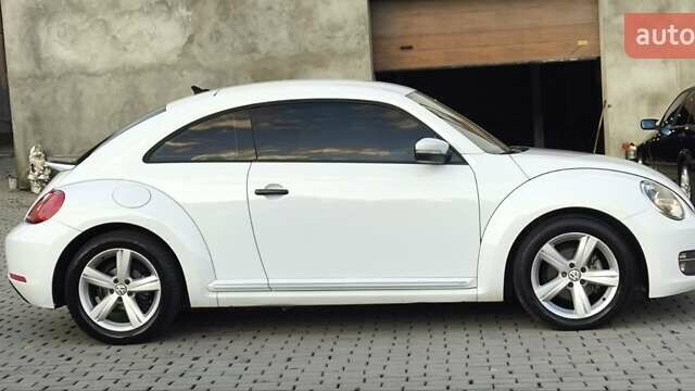 Белый Фольксваген Битл, объемом двигателя 2 л и пробегом 126 тыс. км за 11900 $, фото 1 на Automoto.ua