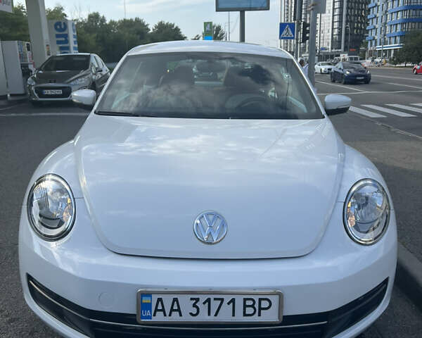 Белый Фольксваген Битл, объемом двигателя 1.8 л и пробегом 65 тыс. км за 15000 $, фото 1 на Automoto.ua