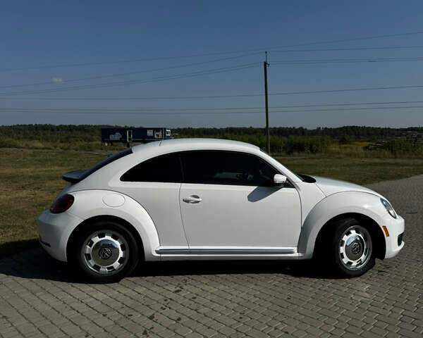 Фольксваген Битл 2015 в Костополе на Automoto.ua Белый Фольксваген Битл, объемом двигателя 1.8 л и пробегом 132 тыс. км за 10900 $, фото 2 на Automoto.ua