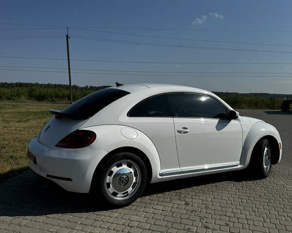 Фольксваген Битл 2015 в Костополе на Automoto.ua Белый Фольксваген Битл, объемом двигателя 1.8 л и пробегом 132 тыс. км за 10900 $, фото 3 на Automoto.ua