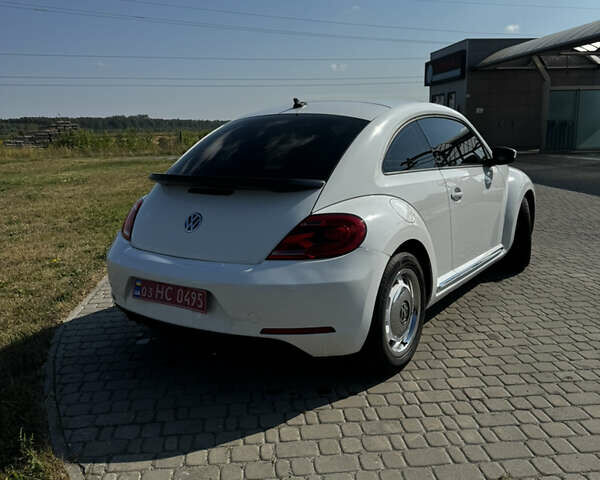 Фольксваген Битл 2015 в Костополе на Automoto.ua Белый Фольксваген Битл, объемом двигателя 1.8 л и пробегом 132 тыс. км за 10900 $, фото 4 на Automoto.ua
